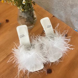 Super fun feather heels by Jeffery Campbell